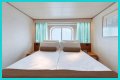 An old Holland America cruise ship is turning residential, letting travelers live at sea for $8,000 a month while it circumnavigates the globe