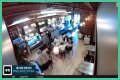 Four masked individuals remove Israeli flags at a Philadelphia cafe. - SarkariResult
