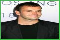 Jonny Lee Miller flashes ink for Ellen charity